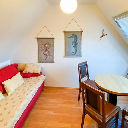 Haus Kormoran, Held *